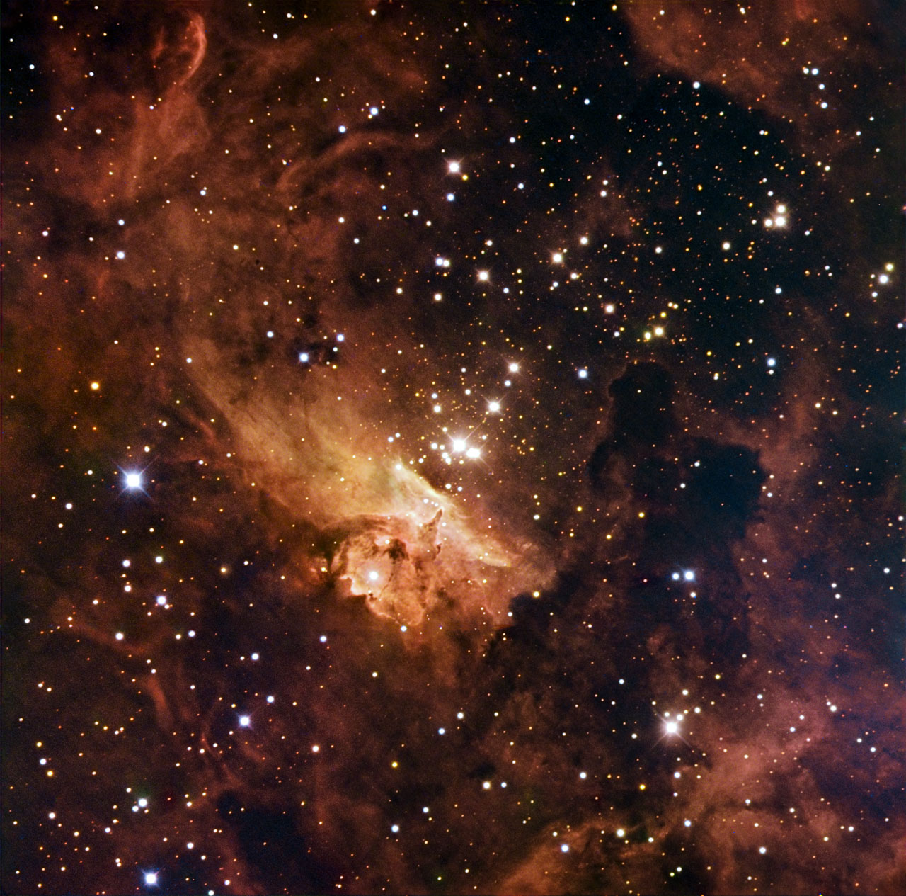 Home to some of the largest stars ever discovered, the open stellar cluster Pismis 24 blazes from the core of NGC 6357, a nebula in the constellation of Scorpius (the Scorpion). Several stars in the clusters weigh in at over 100 times the mass of the Sun, making them real monster stars. The strange shapes taken by the clouds are a result of the huge amount of blazing radiation emitted by these massive, hot stars. The gas and dust of the nebula hide huge baby stars in the nebula from telescopes observing in visible light, as well as adding to the hazy appearance of the image. This image combines observations performed through three different filters in visible light (B, V, R) with the 1.5-metre Danish telescope at the ESO La Silla Observatory in Chile.