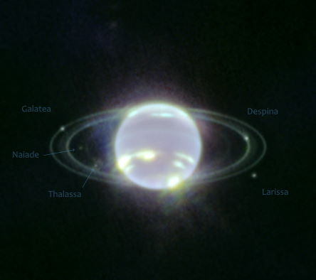 In this version of Webb’s Near-Infrared Camera (NIRCam) image of Neptune, the planet’s visible moons are labeled. Neptune has 14 known satellites, and seven of them are visible in this image. Triton, the bright spot of light in the upper left of this image, far outshines Neptune because the planet’s atmosphere is darkened by methane absorption wavelengths captured by Webb. Triton reflects an average of 70 percent of the sunlight that hits it. Triton, which orbits Neptune in a backward orbit, is suspected to have originally been a Kuiper belt object that was gravitationally captured by Neptune.
